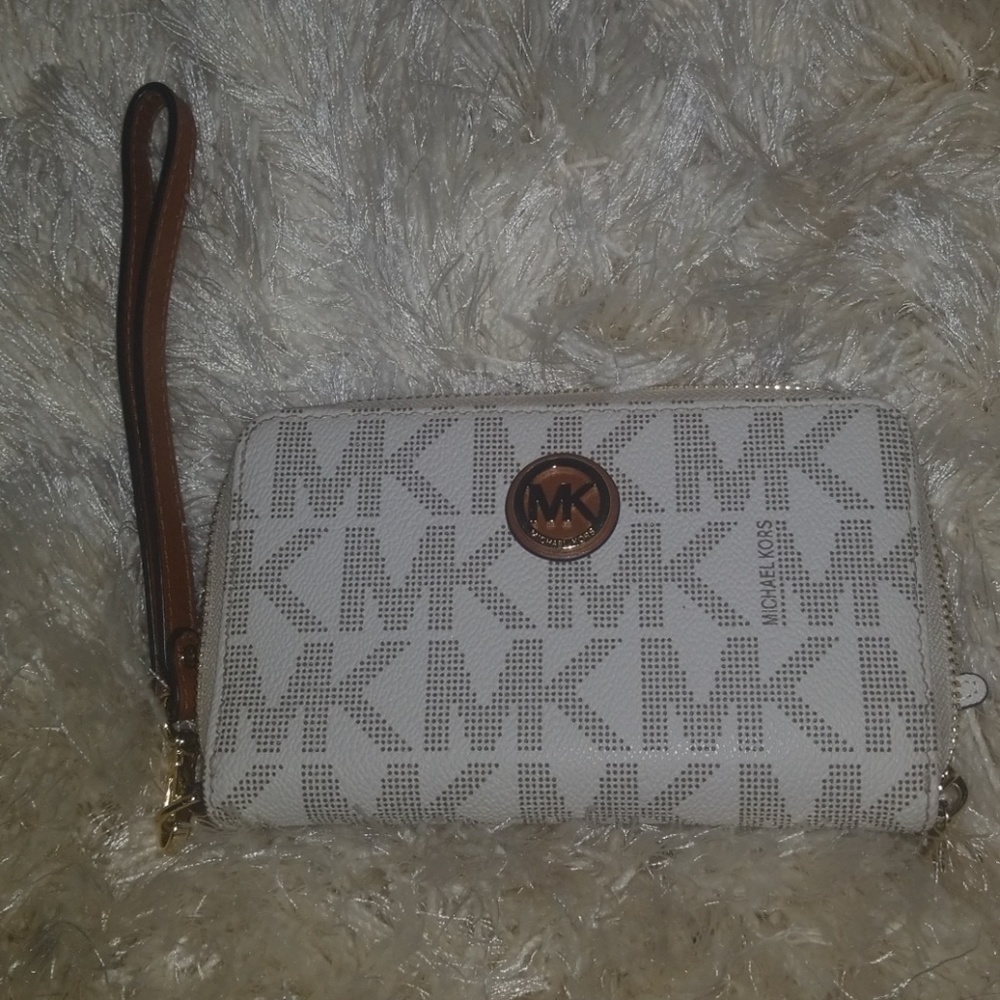 Wristlet able to hold phone